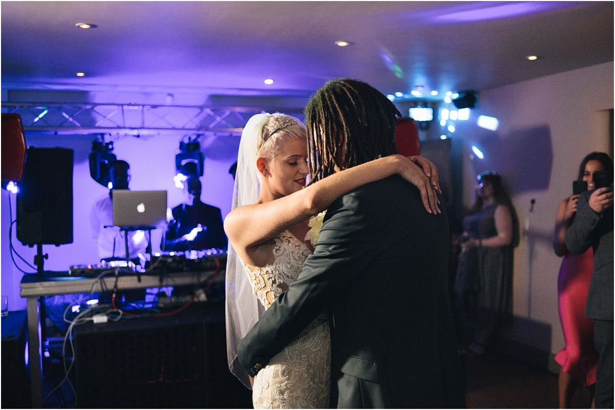  Couple dancing on the dancefloor during their wedding at The Ashes Barns in Staffordshire 
