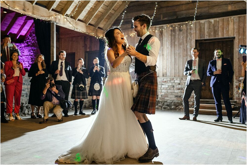  A couple duoing the first dance at their wedding at The Byre At Inchyra in Perthshire in Scotland by Crofts & Kowalczyk Photography 