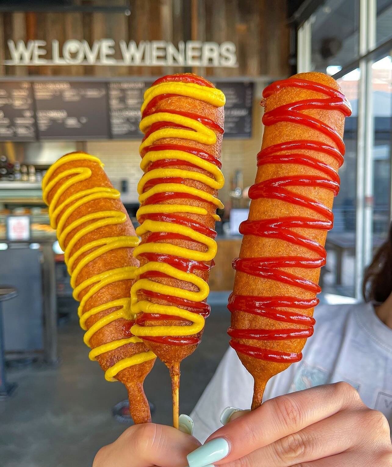 Word on the street is that it's #NationalCornDogDay 👀 🔥

Did you know you can get any @doghaus_bellaterra dogs or sausages dipped in their Haus-made root beer batter + fried as a corn dog!? Celebrate #NationalCornDogDay at DogHaus, and don't forget