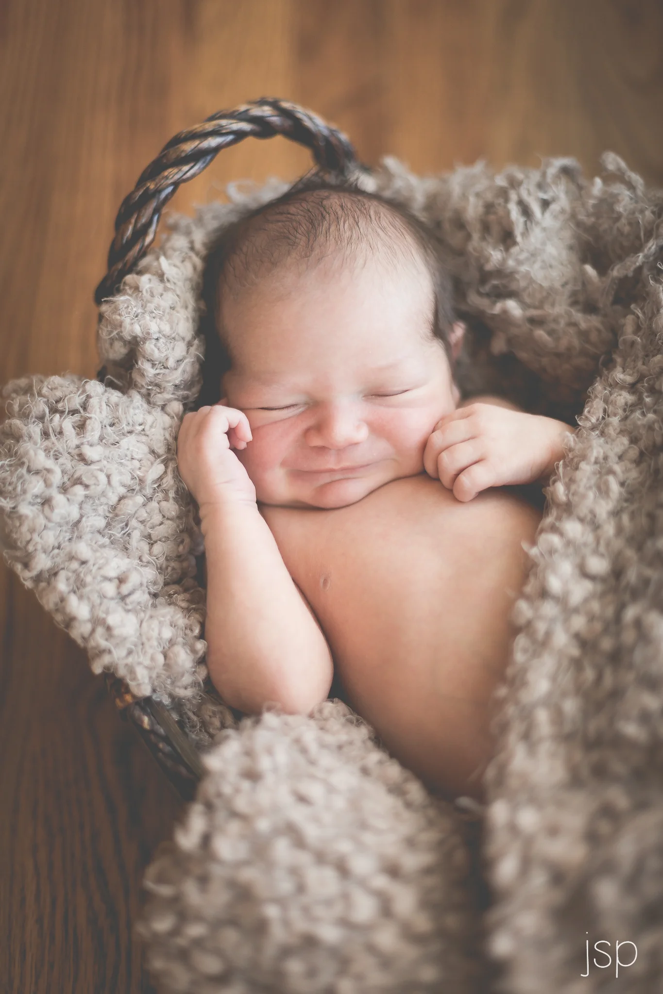 Newborn Smiling in Basket
