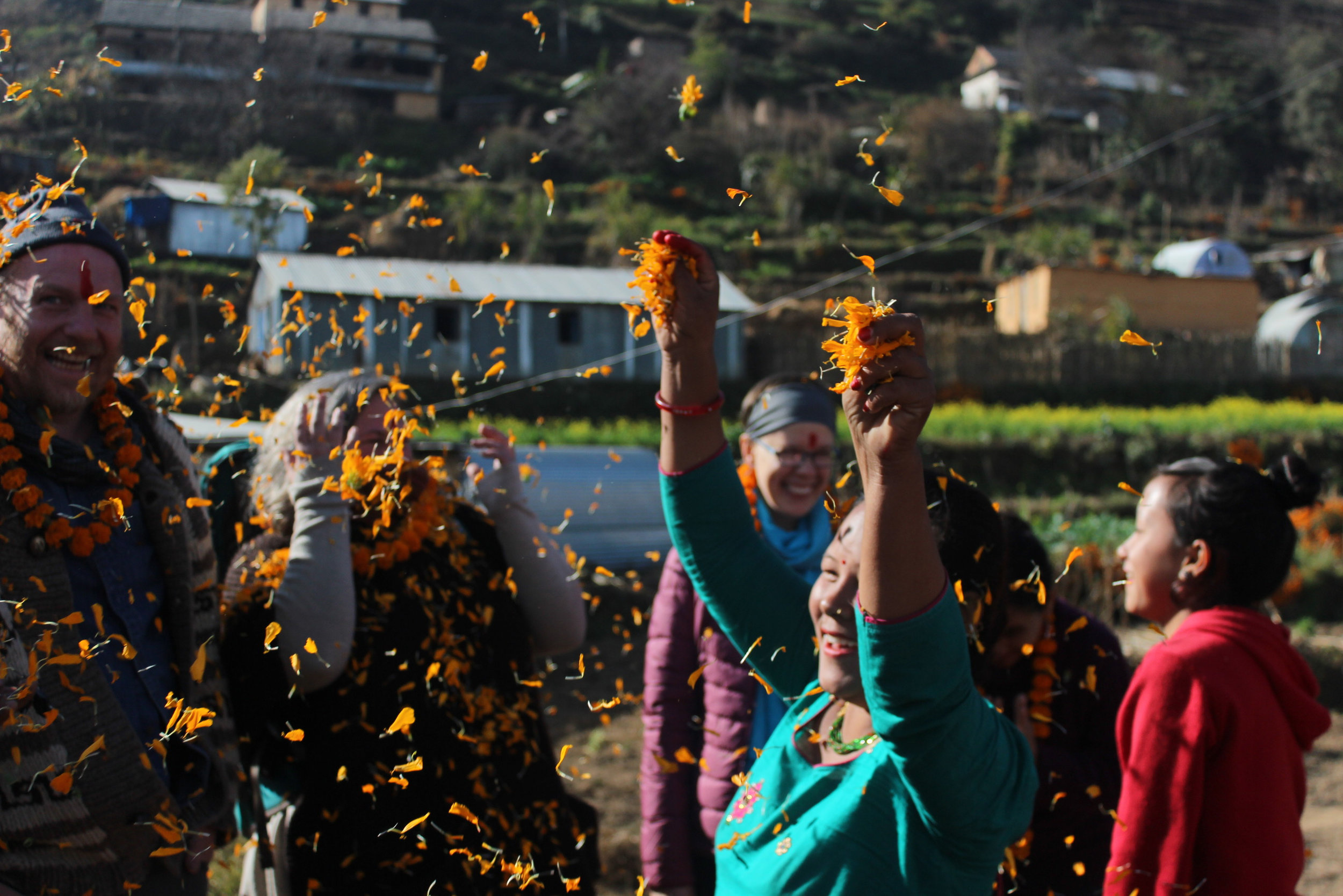 Nepal_Village_Throwing petals.jpg