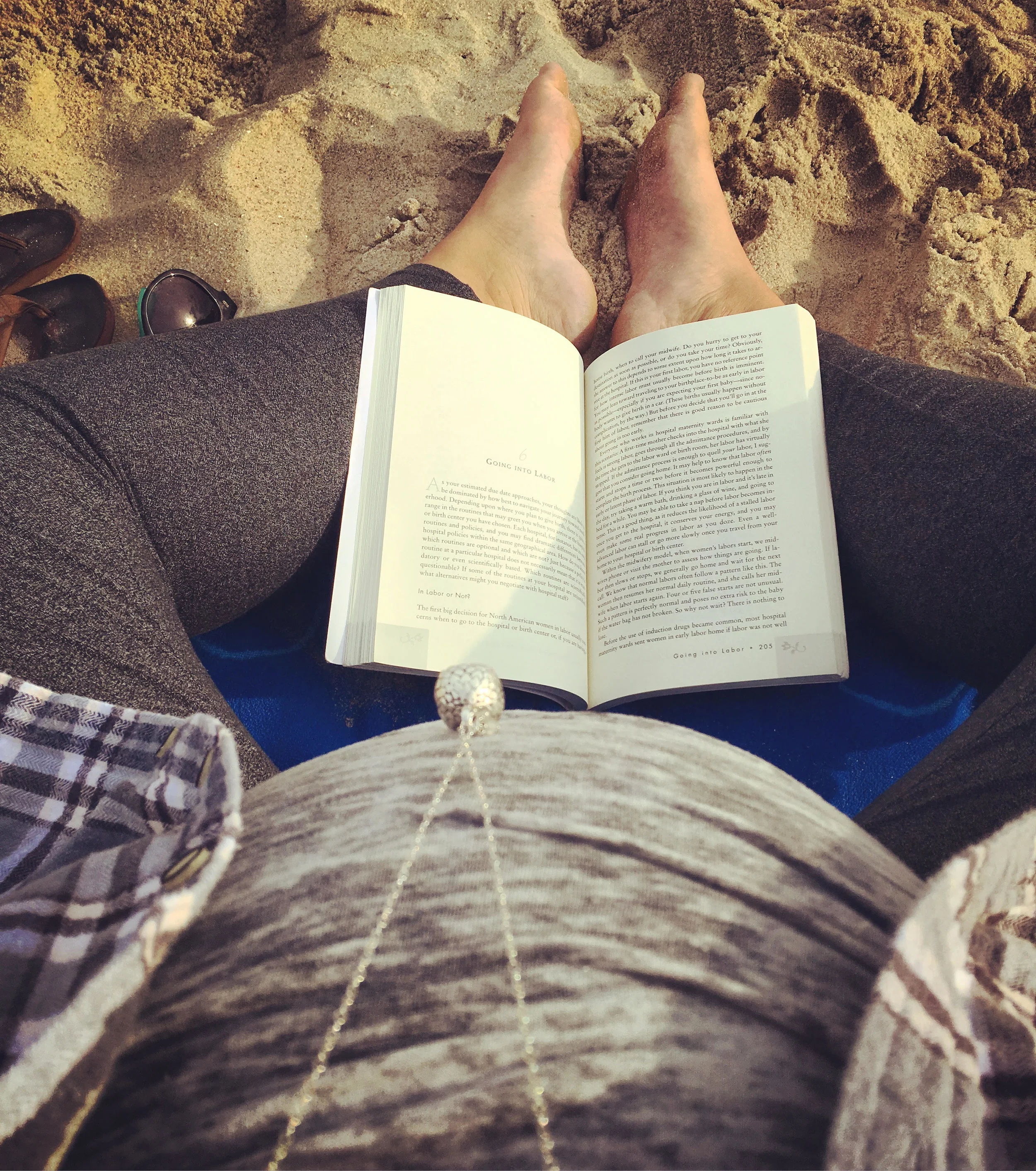 On the beach reading Ina May's Guide to Childbirth...