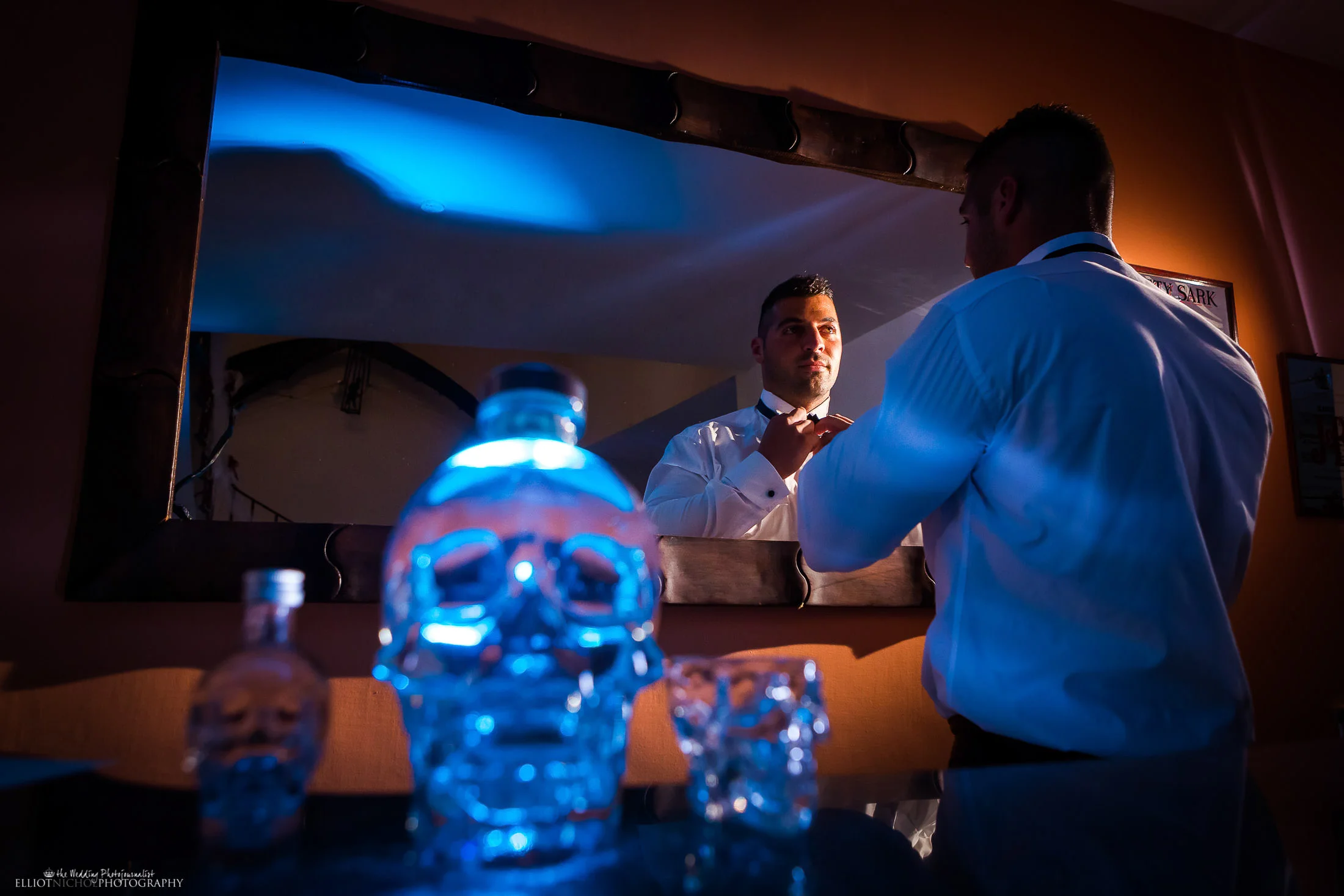 Groom getting ready. Photo by Elliot Nichol Photography.