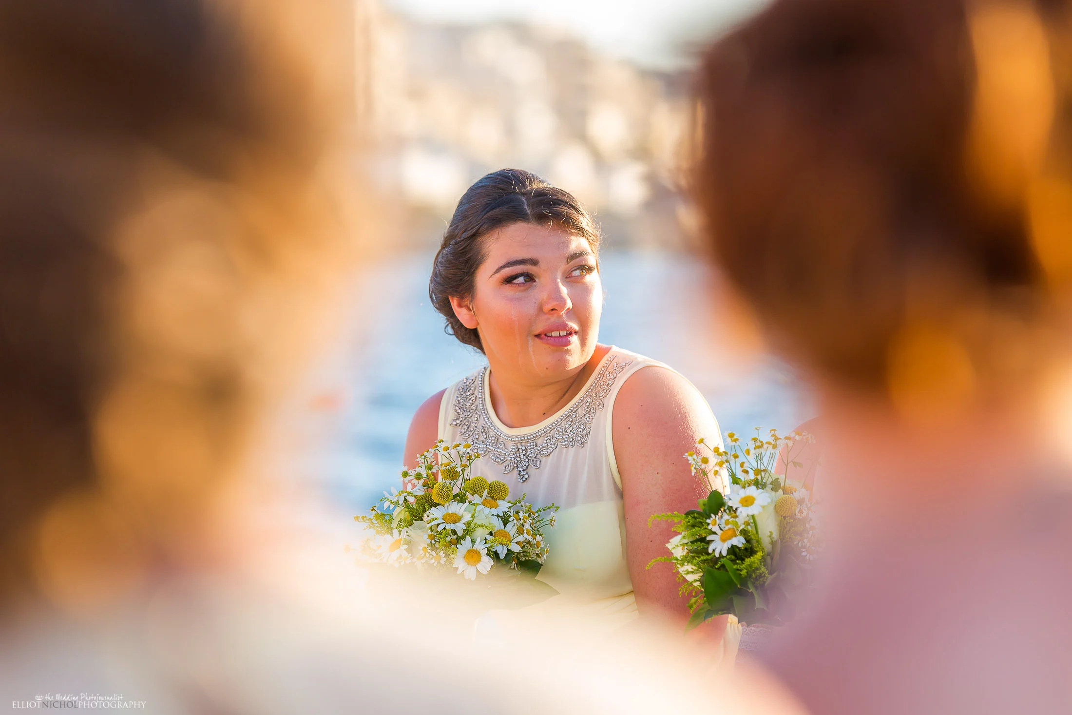 Emotional bridesmaid during the civil wedding ceremony. Photo by Elliot Nichol Photography.