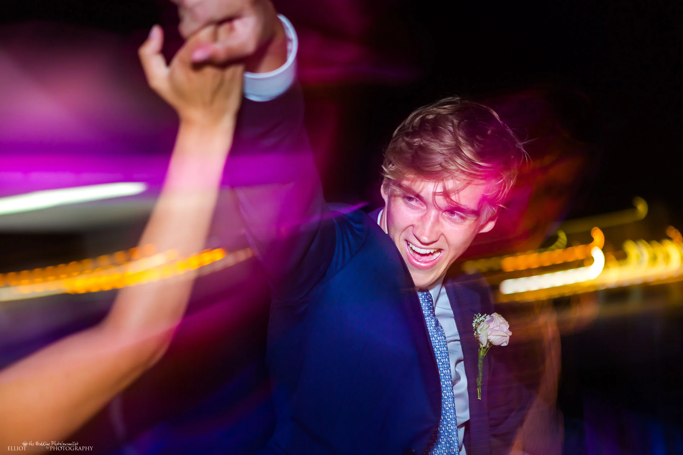 Groom having fun on the wedding reception dance floor. Photo by Elliot Nichol Photography.