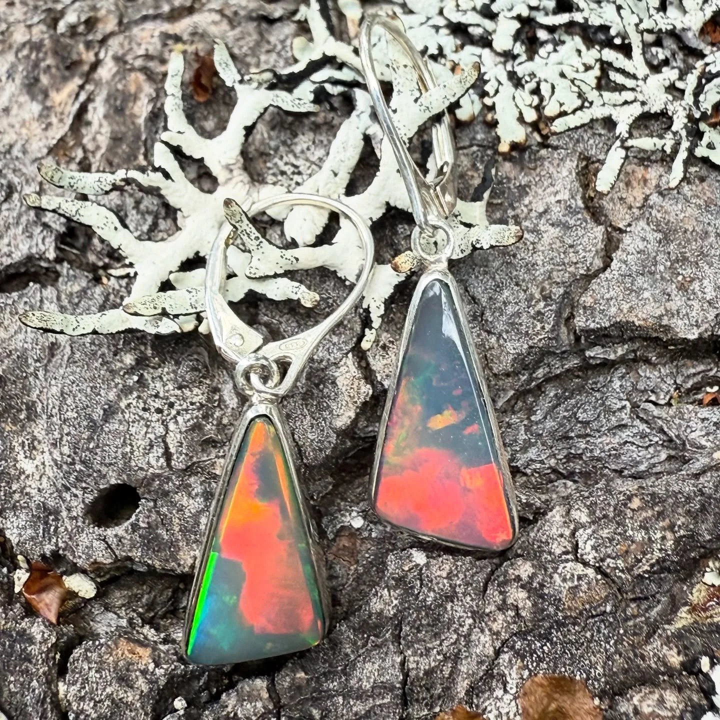 We&rsquo;re still celebrating October&rsquo;s birthstone over here, showing off how vibrant our Ethiopian opal is. These are set in sterling silver, and we have an entire collection also in gold! Visit us in the gallery or reach out for more pictures