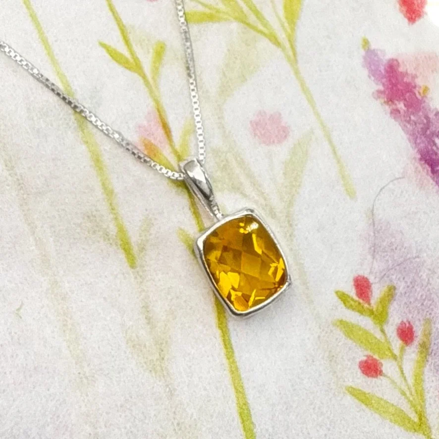 Looking for a sweet, petite and simple gift for that November baby in your life? Antoinette Cleoni is a master of gem selection and beautifully finished silver jewelry, like this checkerboard cut citrine set in a silver bezel. Stop in or call us at T