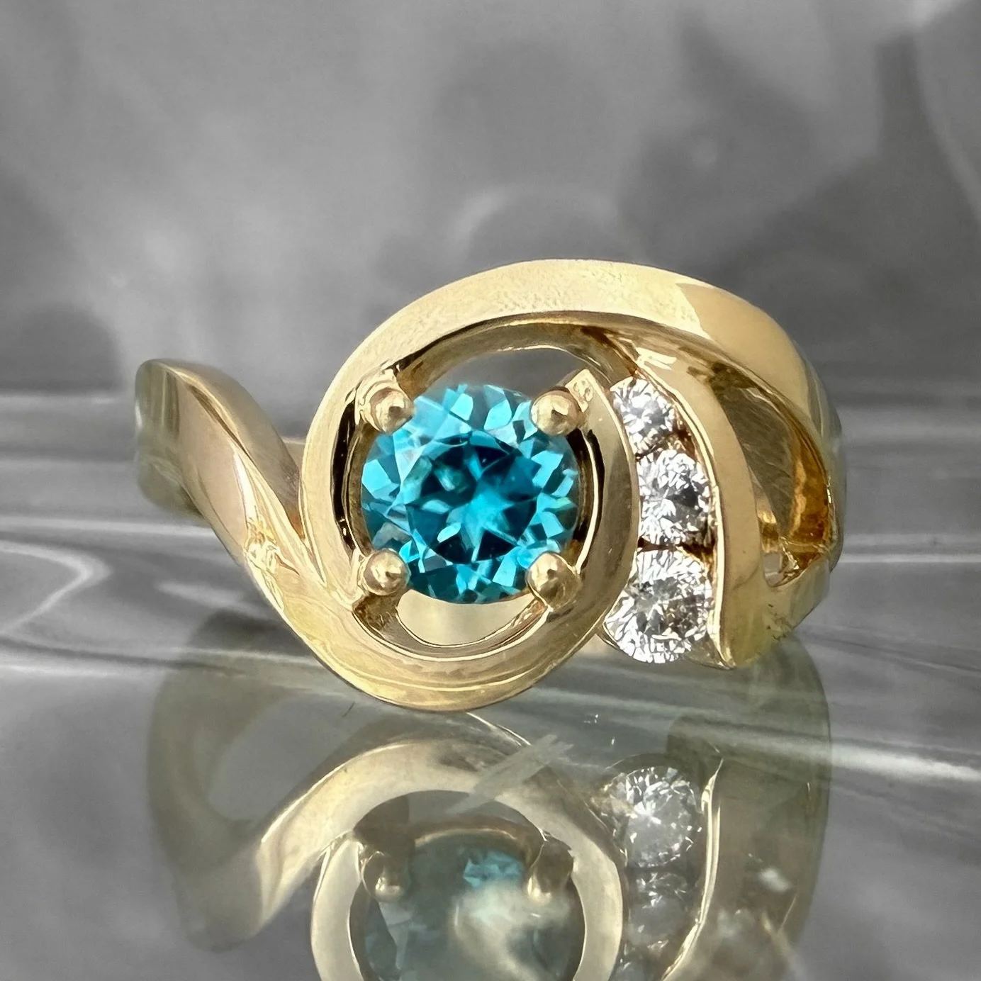 Blue zircon is such a perfect gem to represent December. Icy and vibrant, this gem can display a stunning deep glacial azure, or a pale electric forget-me-not baby blue. Nearly all blue zircon comes heated from Cambodia, though specimen have recently