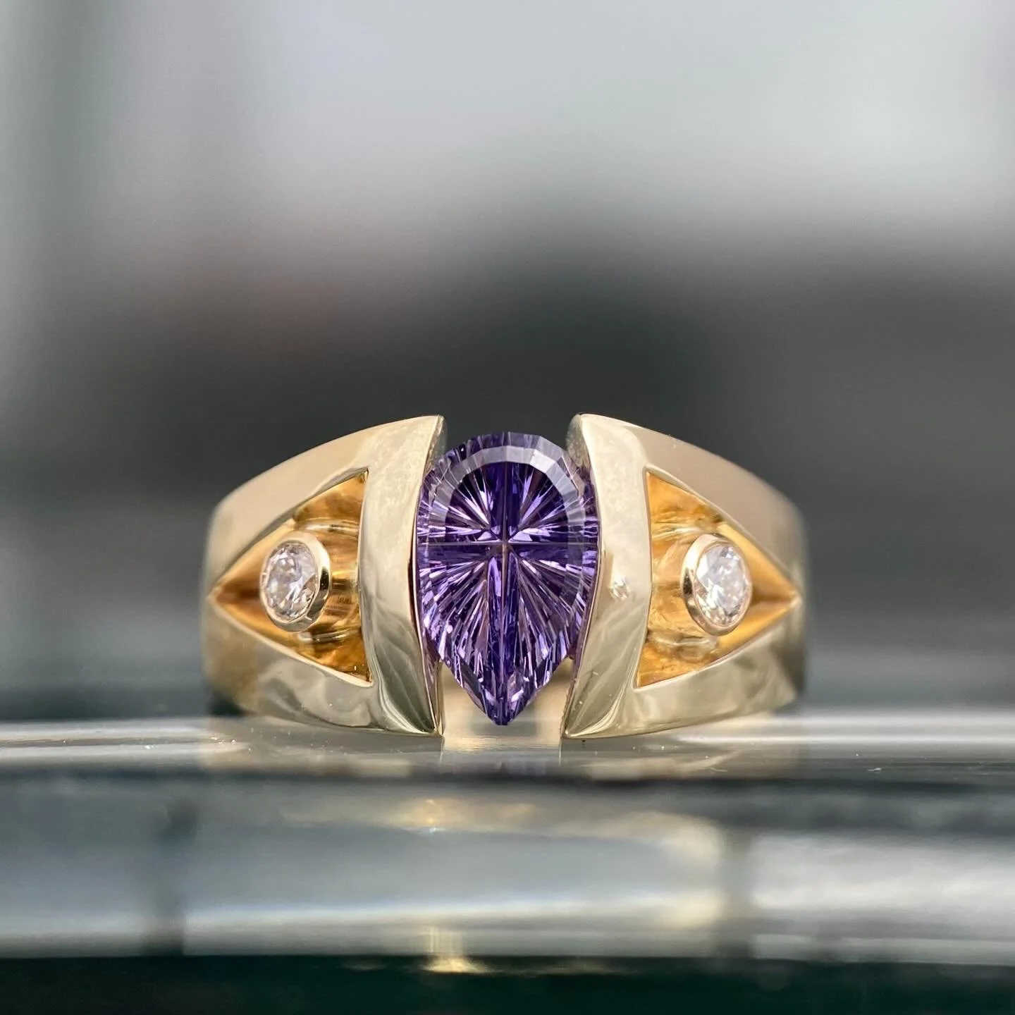 A custom collaboration for the ages! One of our lovely patrons recently went on a jewelry journey. She found this stunning Tanzanian sapphire at the Tucson Rock &amp; Gem show that is cut by the one and only John Dyer! She brought it home to us and p