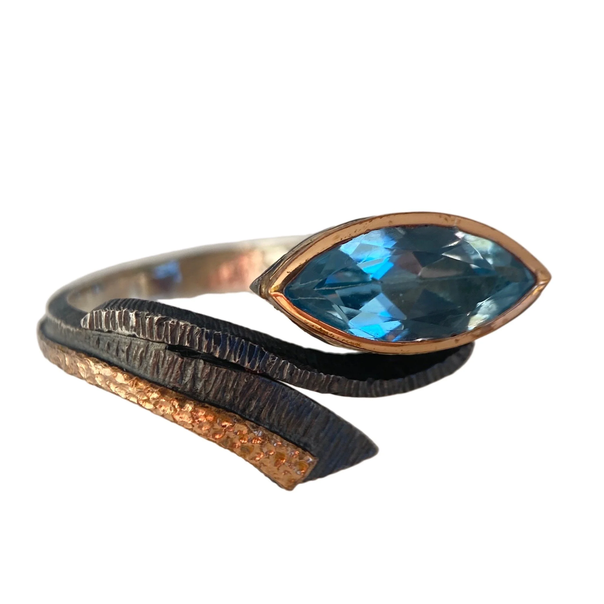 Bora Blue Topaz Offset Flourish Ring