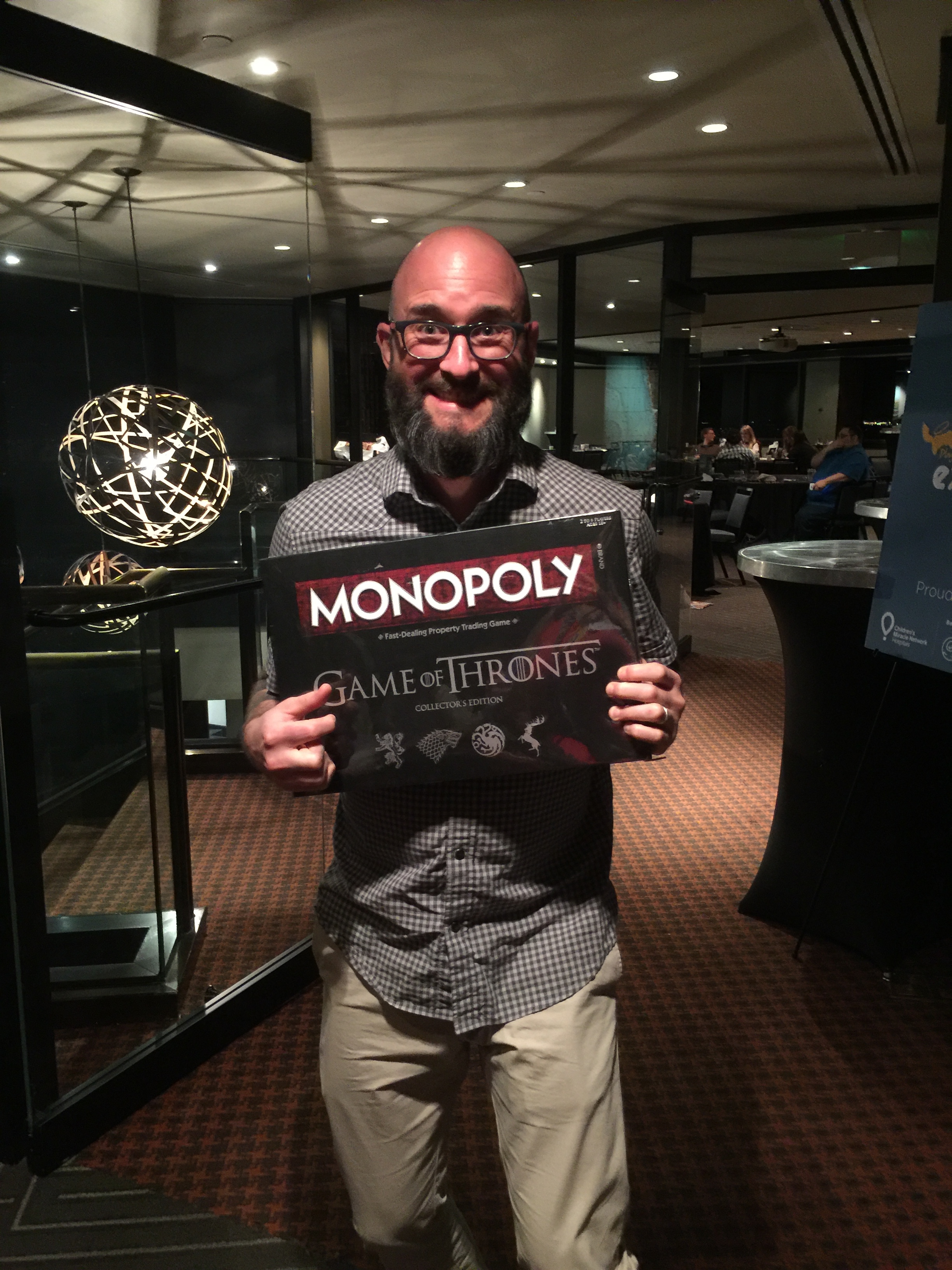 ALL games pictured here were donated by our sponsors. The folks in the images won the games they're holding. Click on any of the images to see more about the game they won!