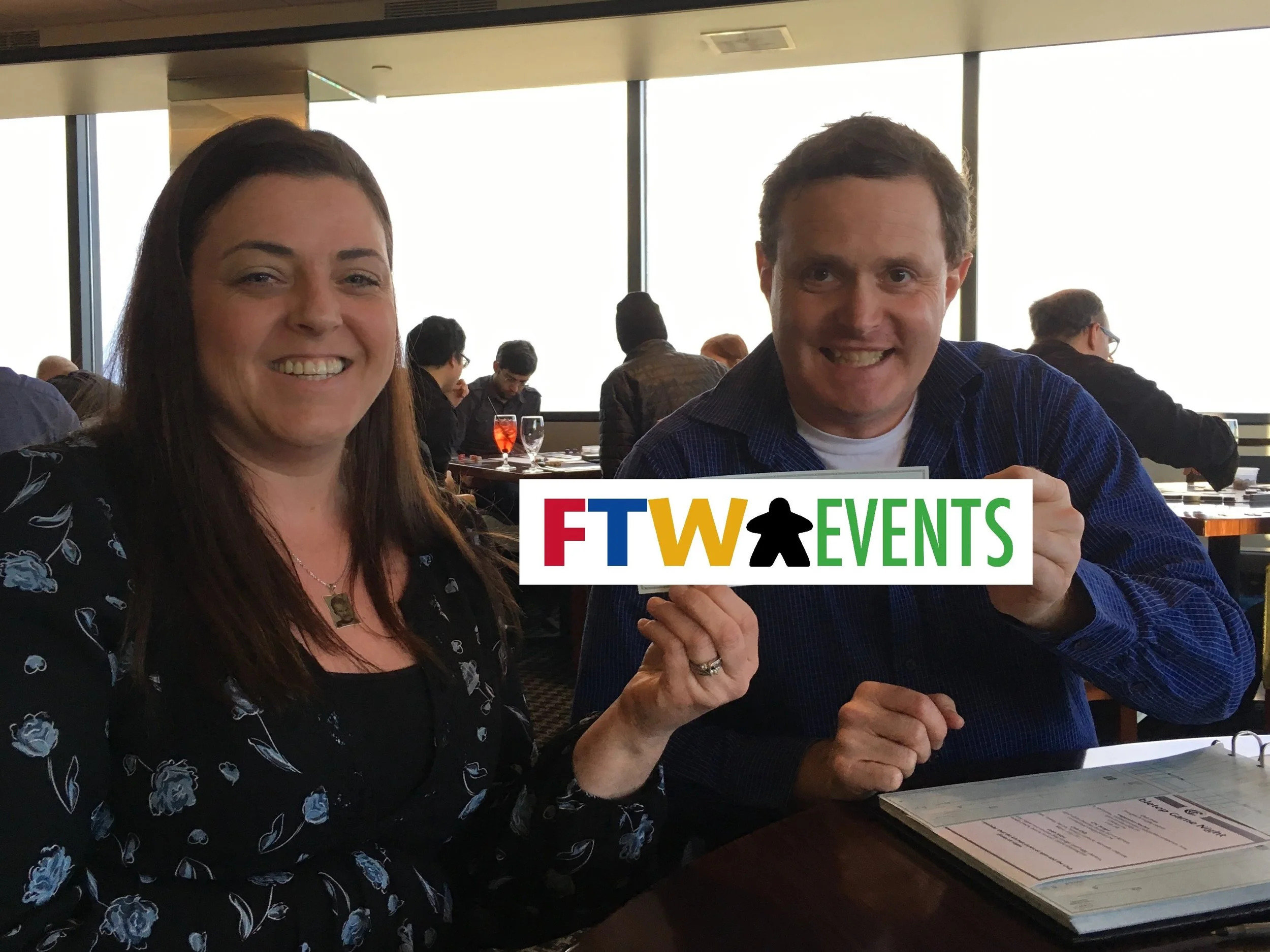 Jennifer Kramer receiving a check donation on behalf of the Imagine Guild and Seattle Children's Hospital, from FTW Events president, Matt Winberry.