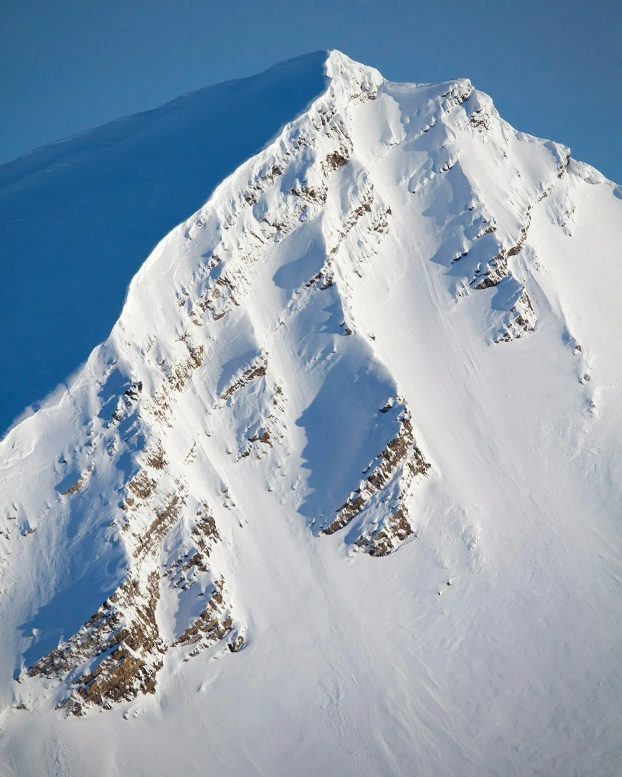 Svalbard. Or Svalgnar as we call it. Our 2026 itineraries are timed for mid-to-late April to take advantage of the absolutely unreal light conditions that come with the return of the midnight sun. At this time of year, the sun hovers just above the h