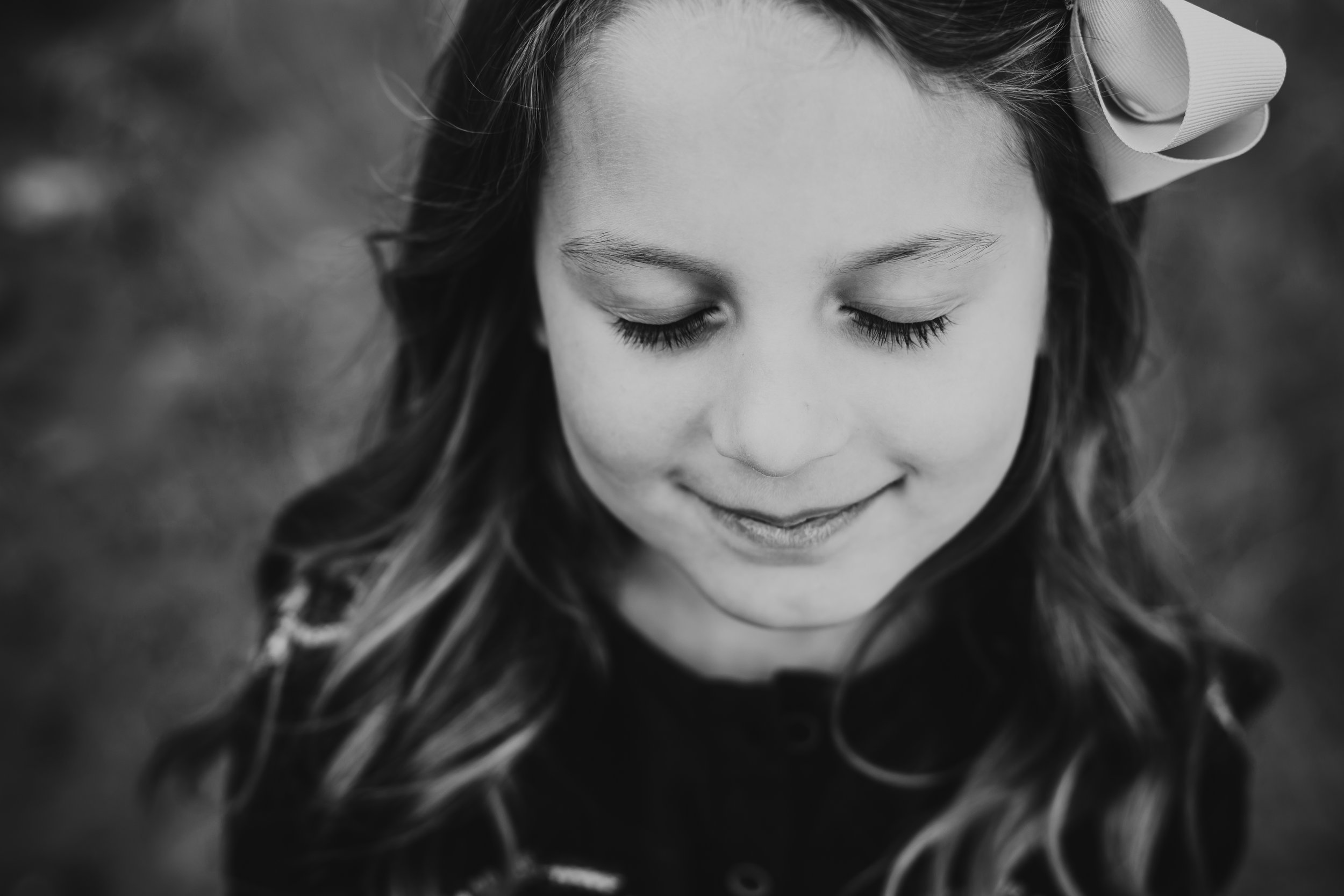 Close up feature picture of big sister during family session in black and white #tealawardphotography #texasfamilyphotographer #amarillophotographer #amarillofamilyphotographer #lifestylephotography #emotionalphotography #familyphotosoot #family #lovingsiblings #purejoy #familyphotos #familyphotographer #greatoutdoors