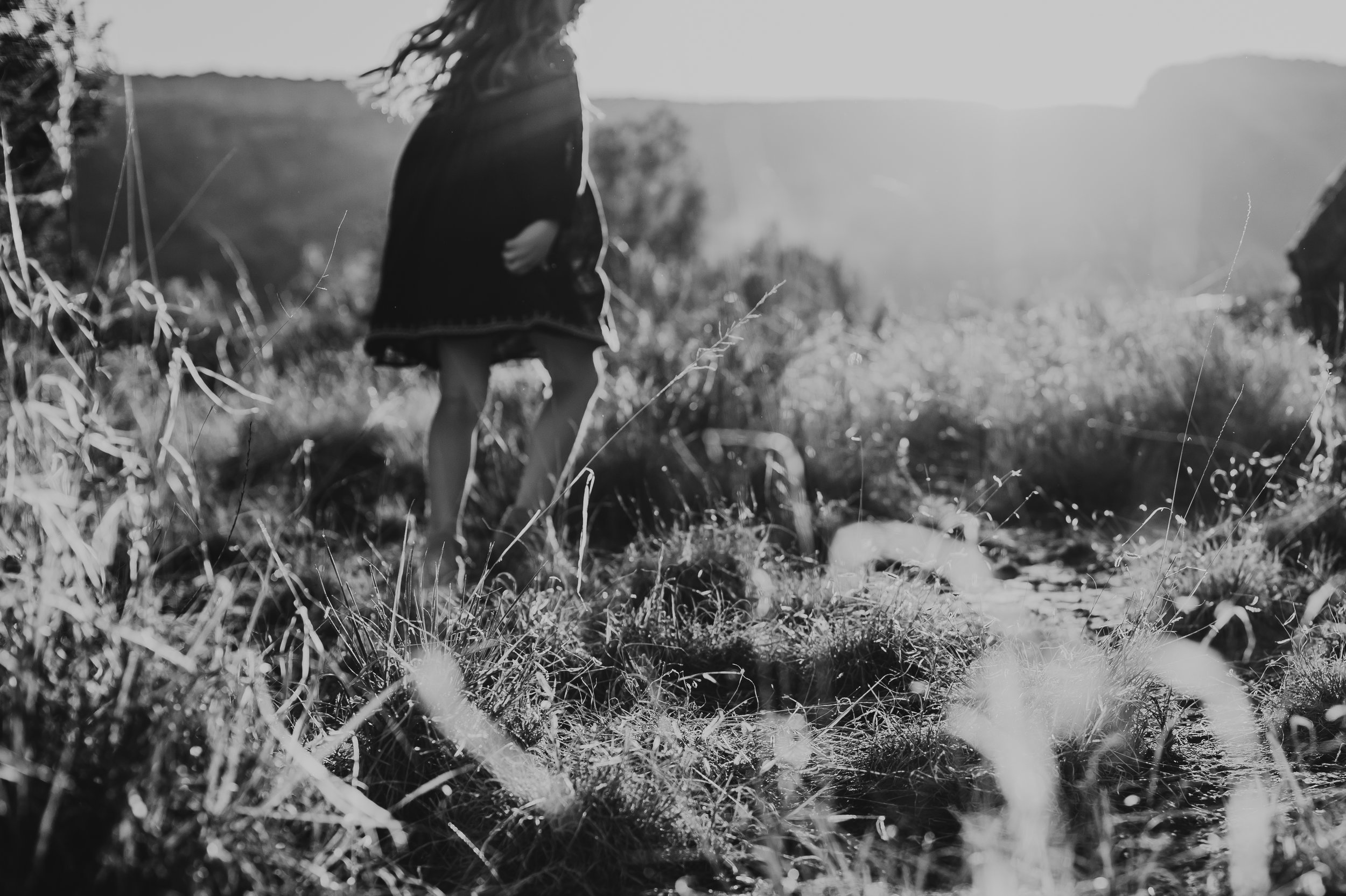Black and white photo dancing in the sun set surrounded by wildflowers #tealawardphotography #texasfamilyphotographer #amarillophotographer #amarillofamilyphotographer #lifestylephotography #emotionalphotography #familyphotosoot #family #lovingsiblings #purejoy #familyphotos #familyphotographer #greatoutdoors