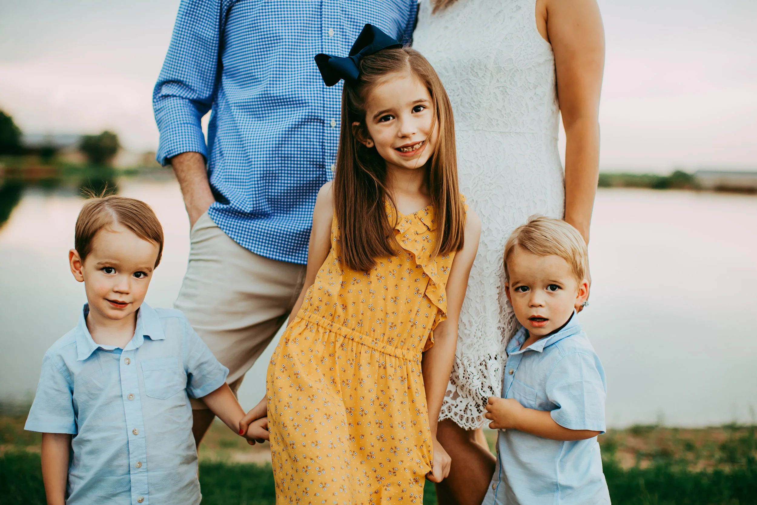 Blue and yellow color scheme worked perfect against the water background #tealawardphotography #texasfamilyphotographer #amarillophotographer #amarillofamilyphotographer #lifestylephotography #emotionalphotography #familyphotosoot #family #lovingsiblings #purejoy #familyphotos #familyphotographer #greatoutdoors #naturalfamilyinteraction