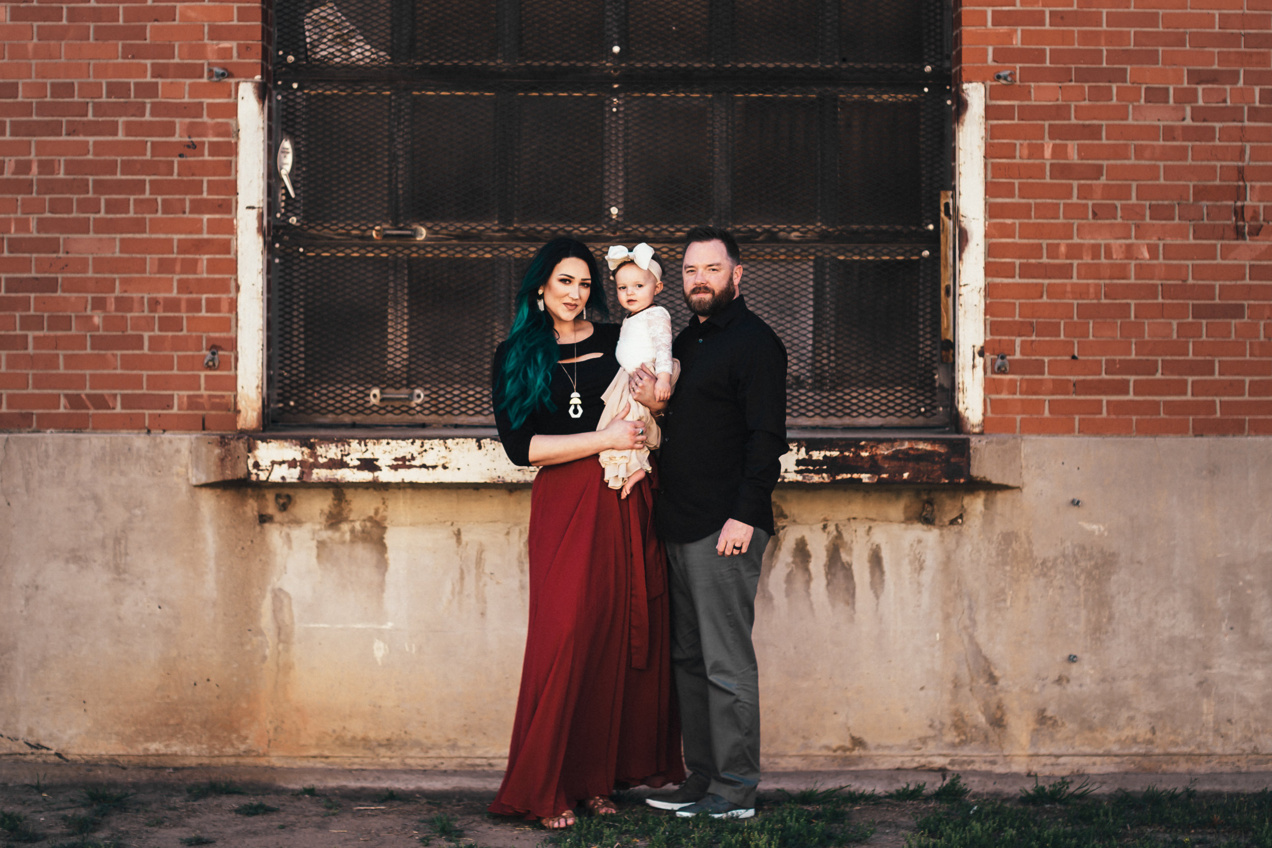 Downtown photo session featuring family of three and run down natural buildings #tealawardphotography #texaslocationchoice #amarillophotographer #amarillofamilyphotographer #emotionalphotography #engagementphotography #couplesphotography #pickingaphotosessionlocation #whatsimportant #everythingtogether #pickingcolorsforphotos #location #photosessionlocation