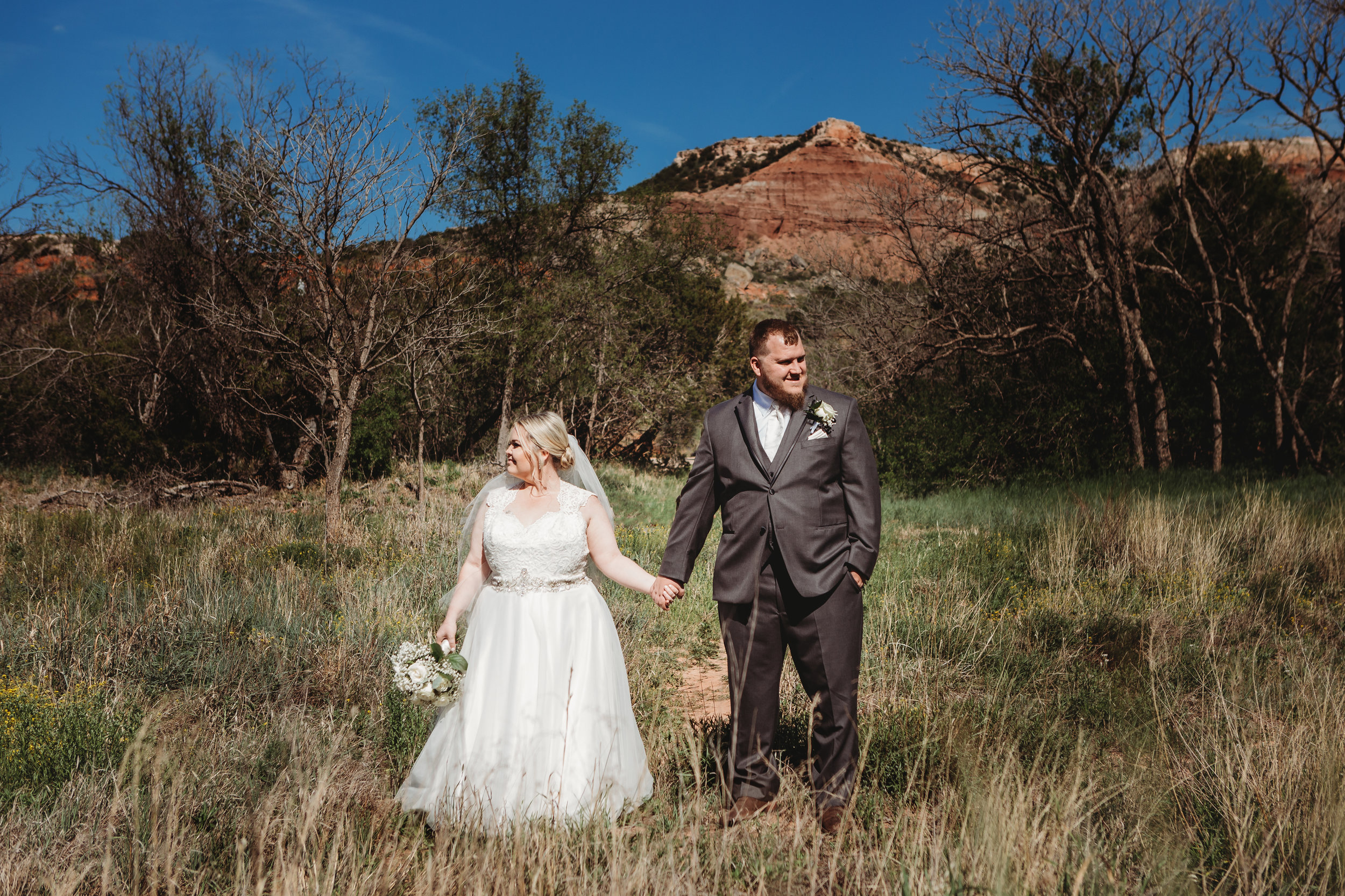  Beautiful skies at Palo Duro Canyon with the bride and groom for portraits before their ceremony #tealawardphotography #texasweddings #amarillophotographer #amarilloweddingphotographer #emotionalphotography #intimateweddingphotography #weddingday #weddingphotos #texasphotographer #inspiredwedding #intimatewedding #weddingformals #bigday #portraits 