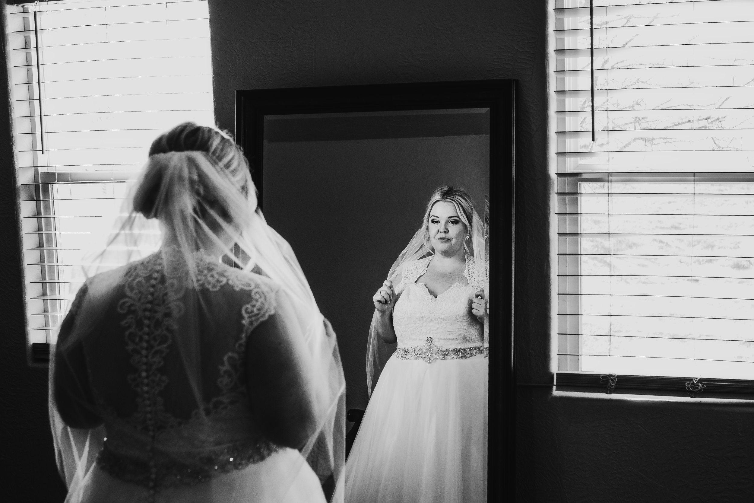  Mirror photo of the bride showing all the detail in her dress, veil and accessories #tealawardphotography #texasweddings #amarillophotographer #amarilloweddingphotographer #emotionalphotography #intimateweddingphotography #weddingday #weddingphotos #texasphotographer #inspiredwedding #intimatewedding #weddingformals #bigday #portraits 