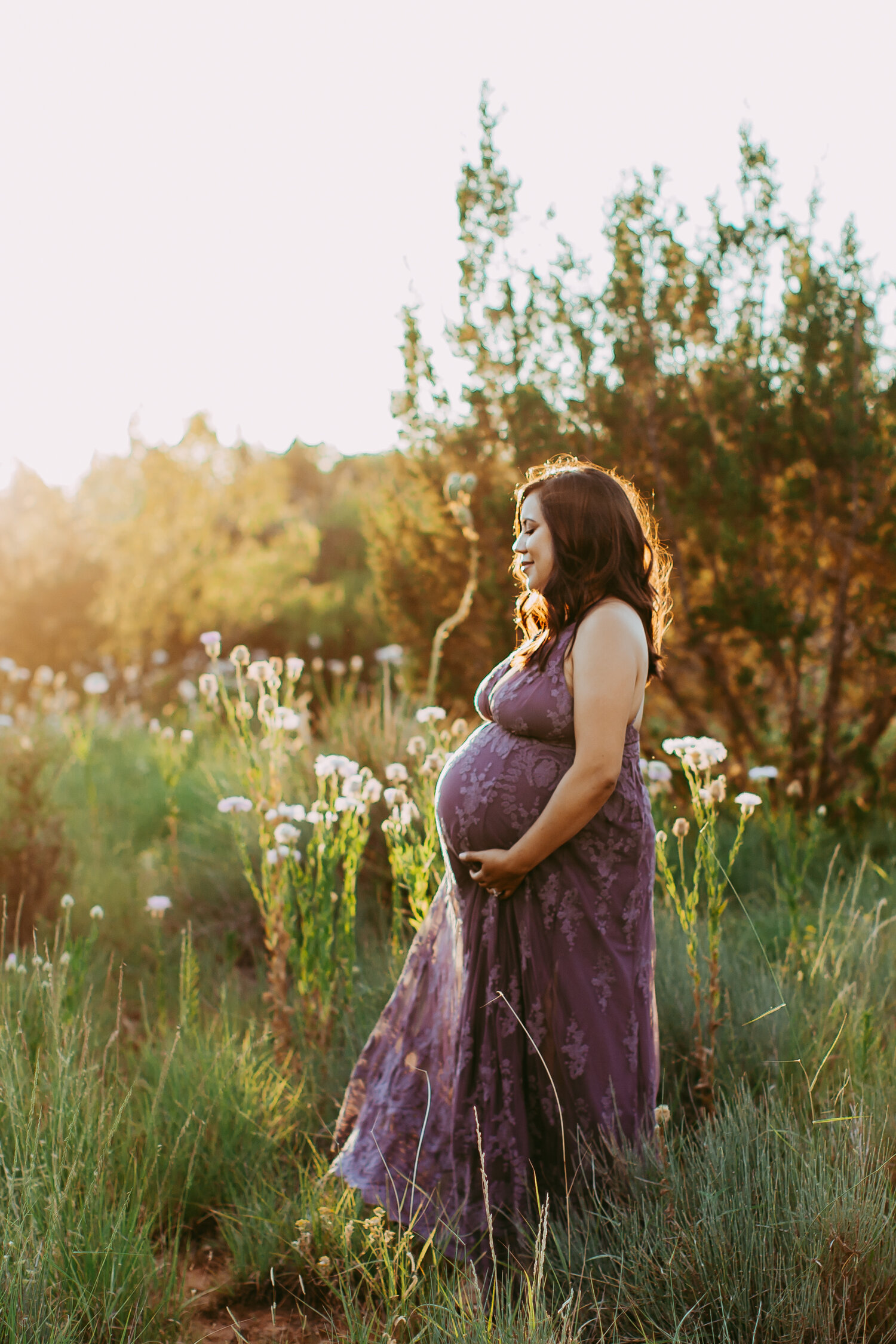 The sun set lit the wildflowers in the field on fire during this maternity photo shoot #tealawardphotography #texasmaternityphotographysession #amarillophotographer #amarilloematernityphotographer #emotionalphotography #lifestylephotography #babyontheway #lifestyles #expectingmom #newaddition #sweetbaby #motherhoodmagic