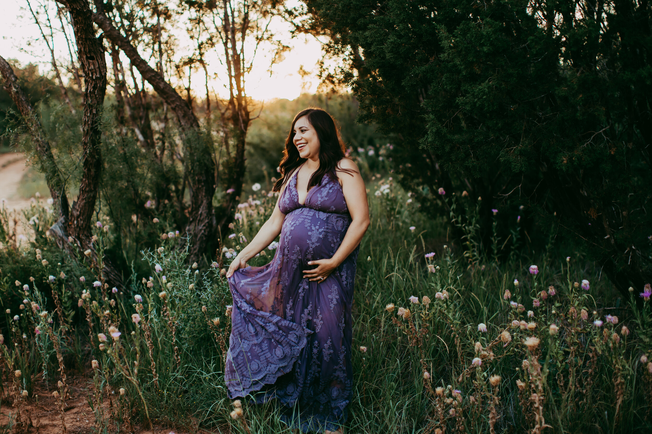 Walking with her dress fanned out while holding her baby belly. Beautiful! #tealawardphotography #texasmaternityphotographysession #amarillophotographer #amarilloematernityphotographer #emotionalphotography #lifestylephotography #babyontheway #lifestyles #expectingmom #newaddition #sweetbaby #motherhoodmagic