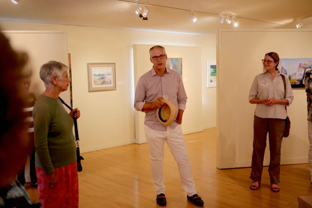 Bruce Kane, Executive Director of the Kings County Art Center, introducing the exhibit.