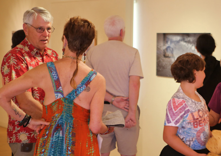 Richard King, (far left) carefully transported the YR31 artwork from the museum gallery in Yosemite to the Kings County Art Center in Hanford.