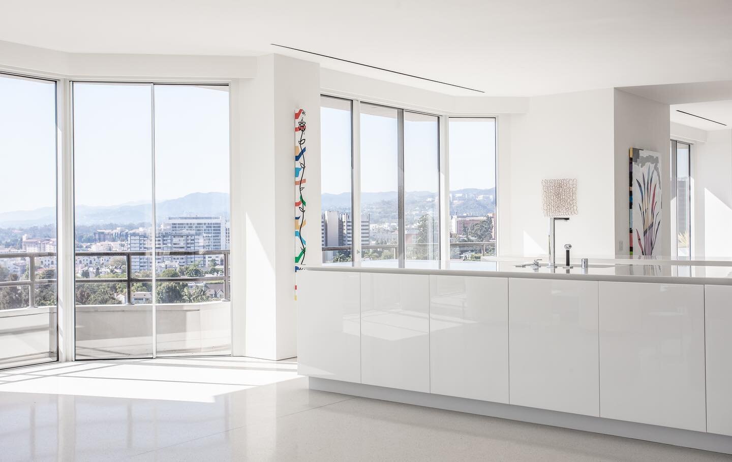 Our White Out penthouse project. So, it&rsquo;s all about the details. We chose to work with @boffi_official @silvia_frigerio for the exquisite kitchen. 
.
.
Built by @modaainc 
Art by @this_means 
Photo by @michaelcliffordphotography 
.
.
.
#minimal