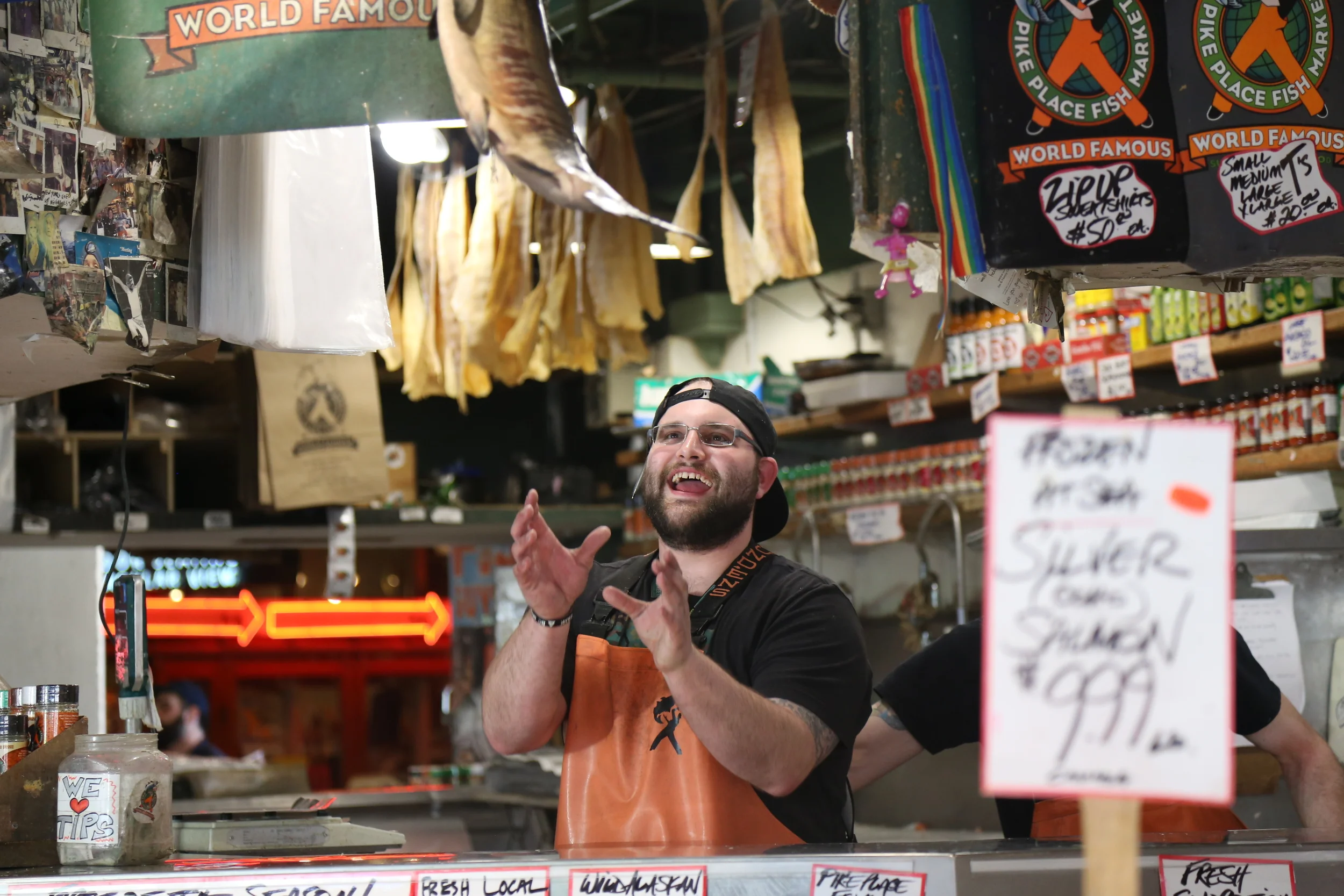 Watching the guys throw fish is one of our favorite things to do at the market.