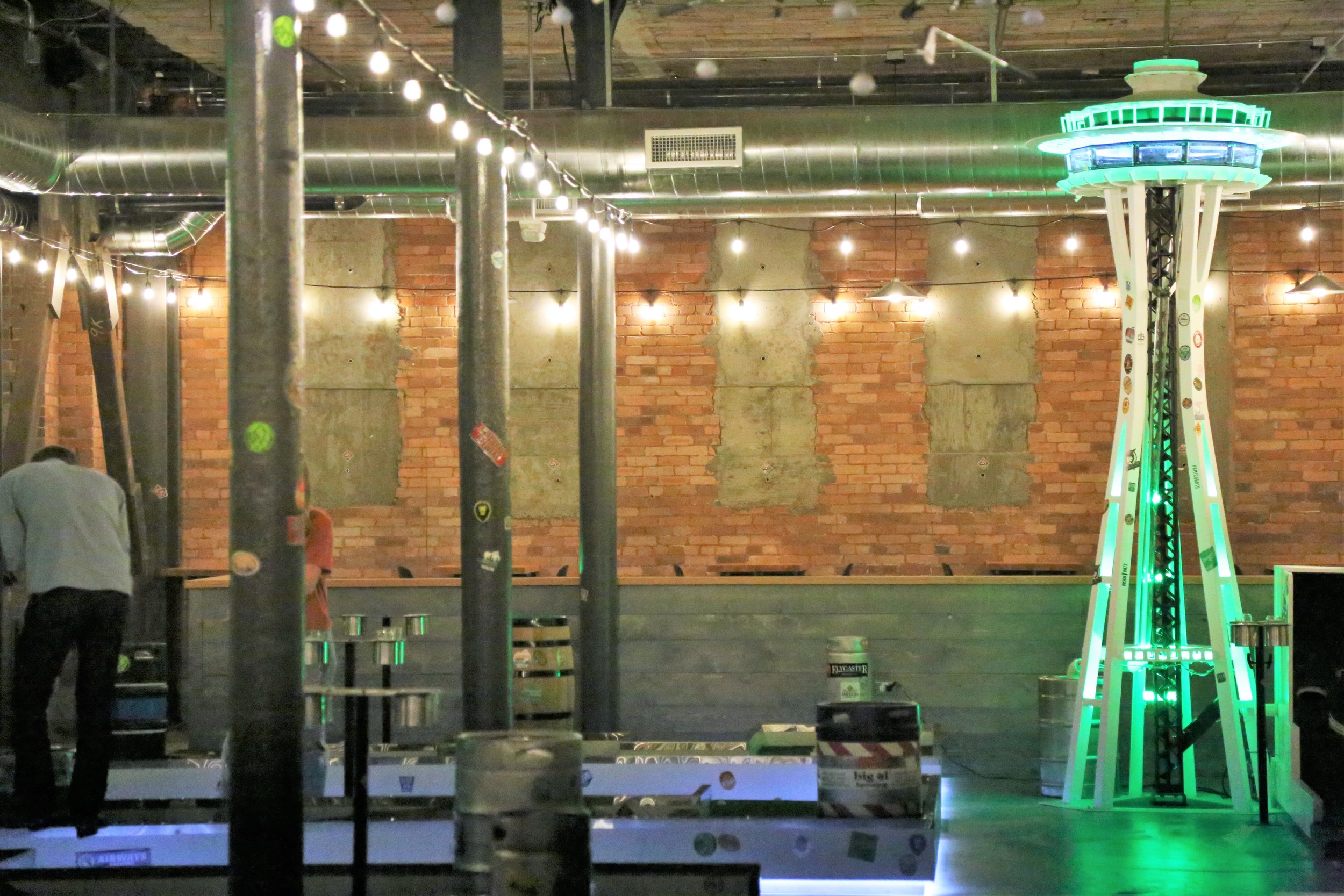 This light-up Space Needle takes your ball at the end of mini-golf. Um...cool.