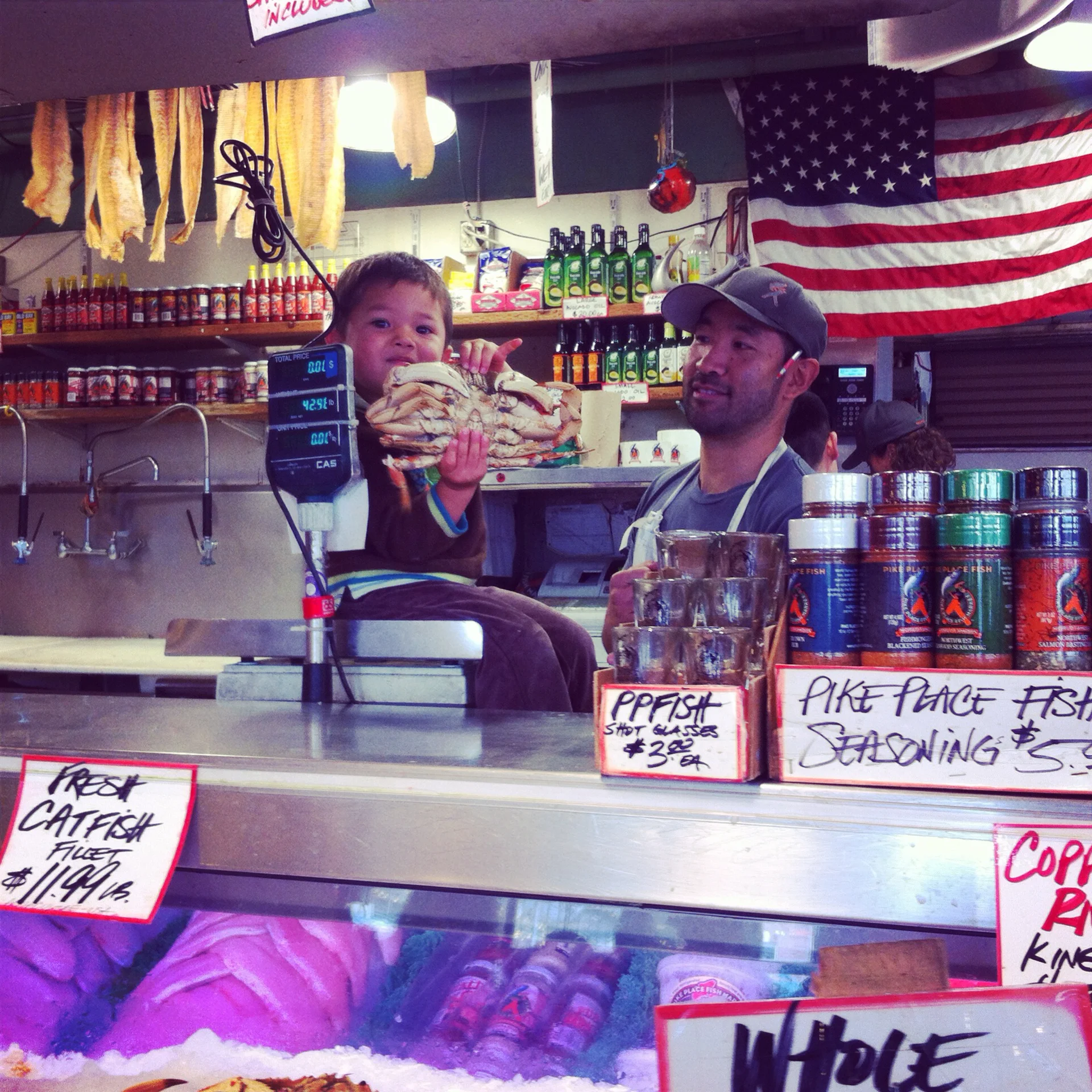 The guys at Pike Place Fish give kids the ultimate experience