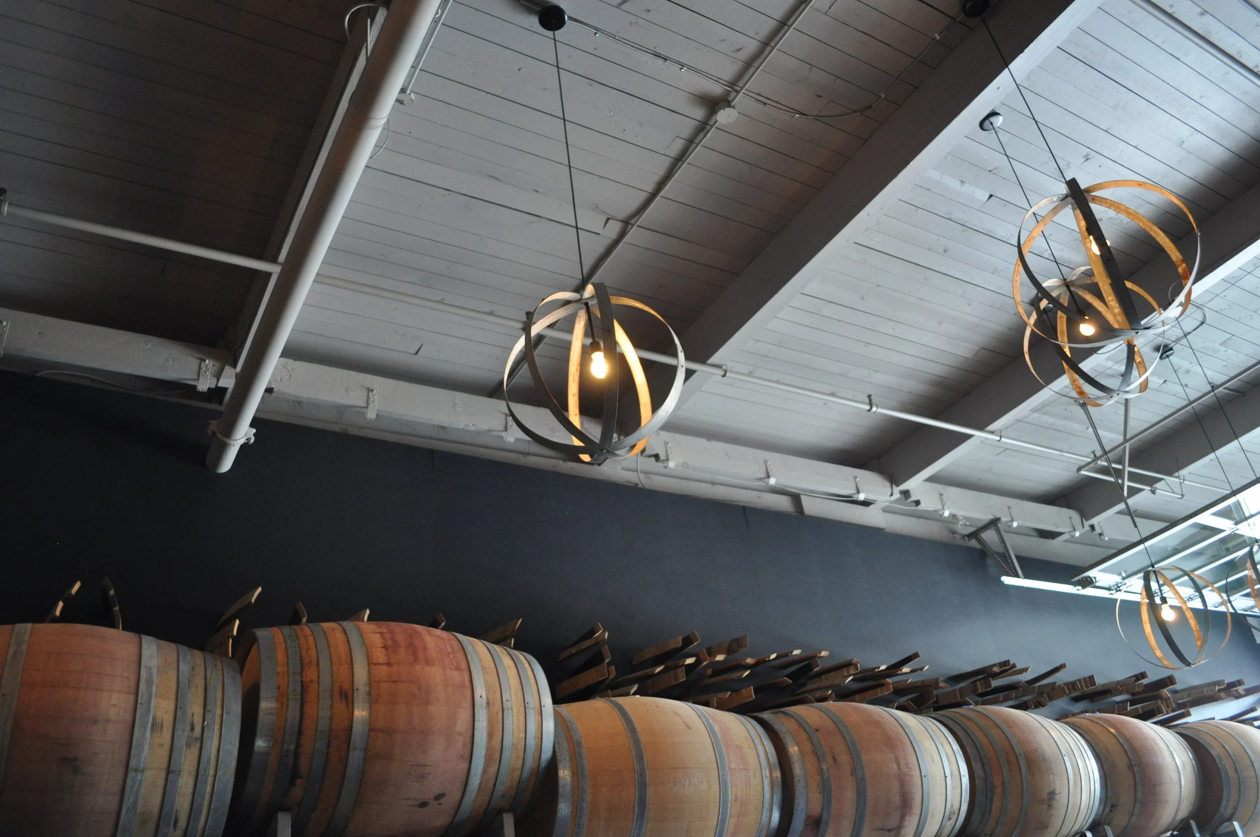 Deconstructed barrels are repurposed at Kerloo Cellars’ tasting room in SoDo.