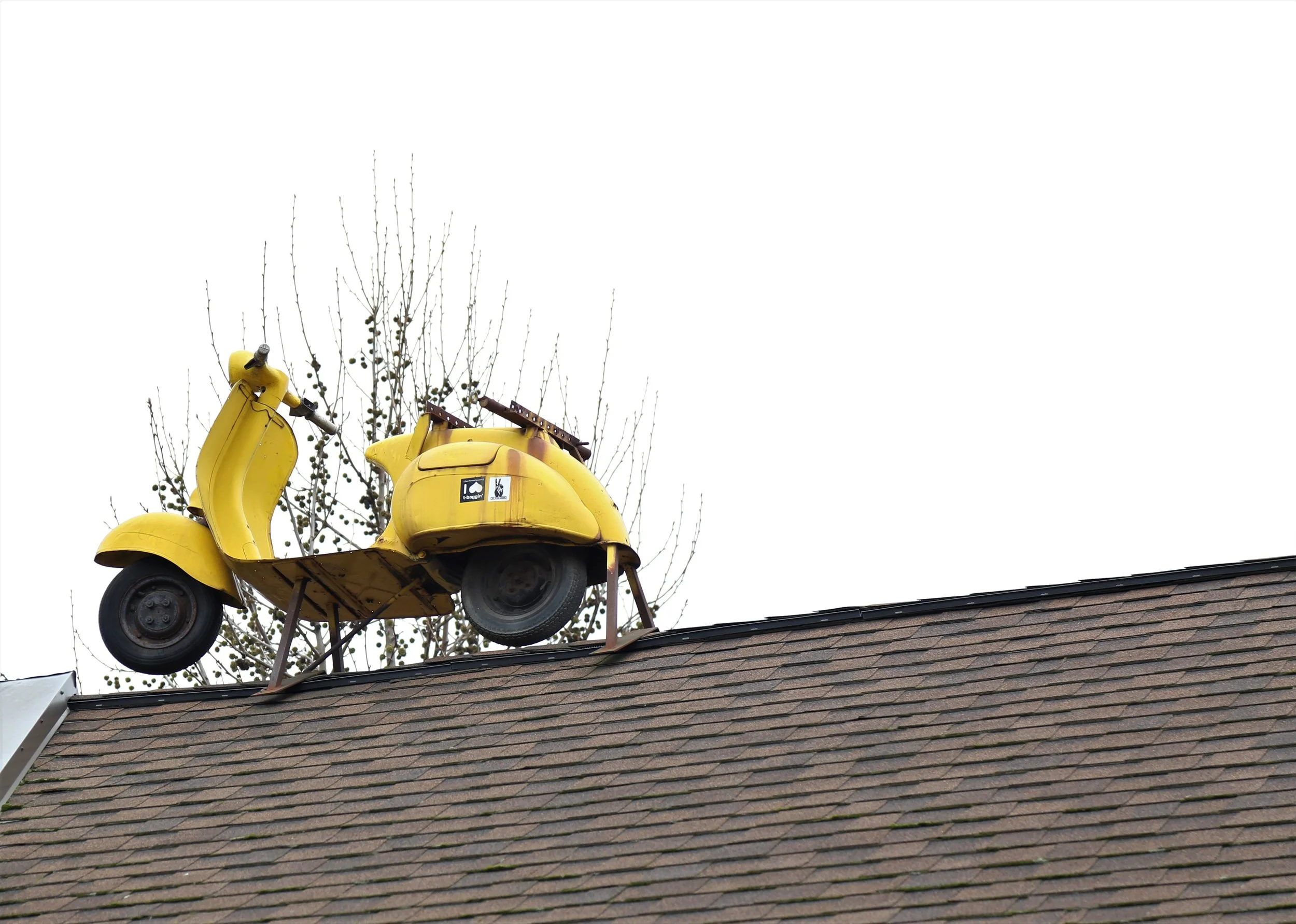 A scooter on a roof? Why not.