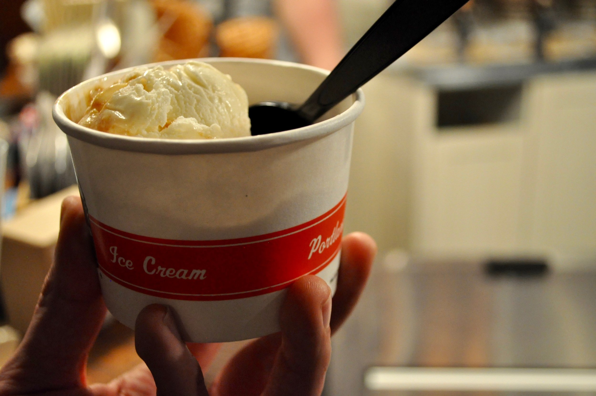 Seasonal passionfruit scoop on top of a scoop of salted caramel. So. Good.&nbsp;