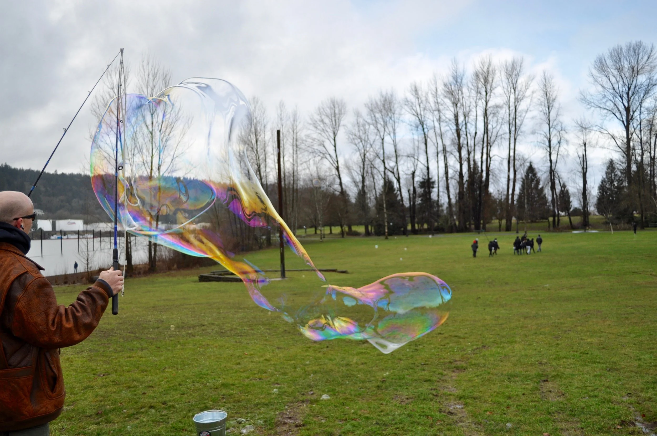 man blowing bubbles