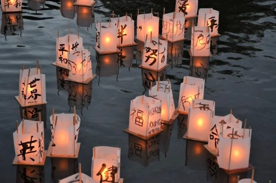 Lanterns on the lake at Hiroshima to Hope. Photo by Martha Brice.