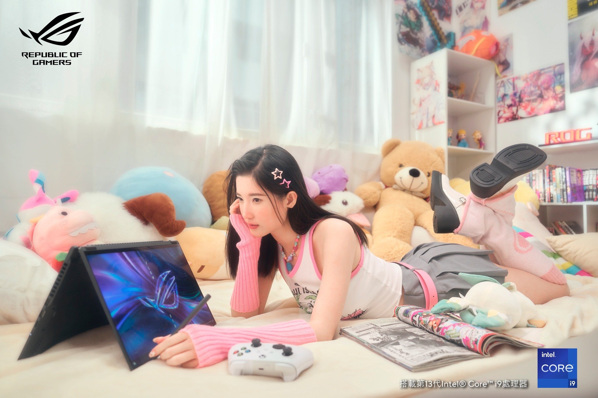 Photo by ROG Hong Kong on November 22, 2023. May be a video game screenshot of sleepwear, tablet, screen, videogame controller, beanbag chair and bedroom..jpg