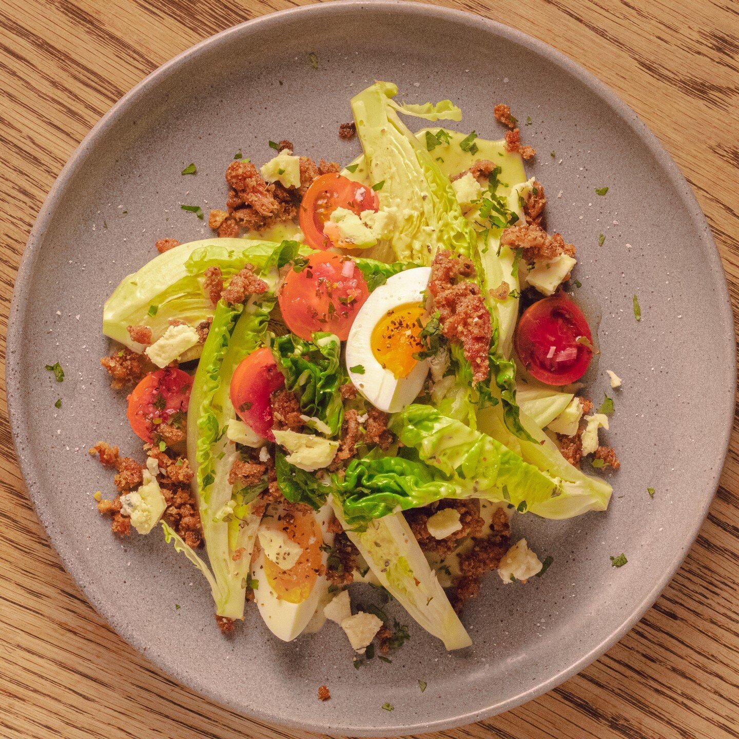 Our Cobb salad has a sherry dijon vinaigrette dressing on it that is good enough to drink on its own, and we think that's just swell. We won't serve you a glass of just the dressing, but the salad will be one of the best Cobb salads you've ever had.