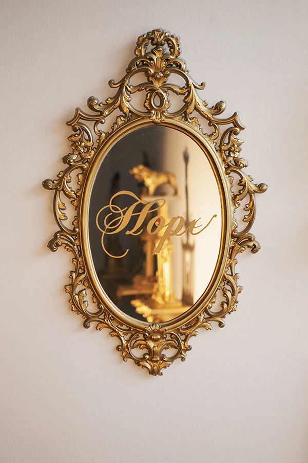 "Hope" Mirror, gold vinyl, spray paint 33" x 21"
