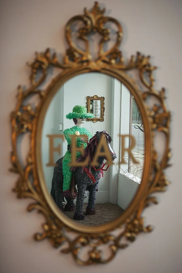 "Fear" Mirror, gold vinyl, spray paint 33" x 21"