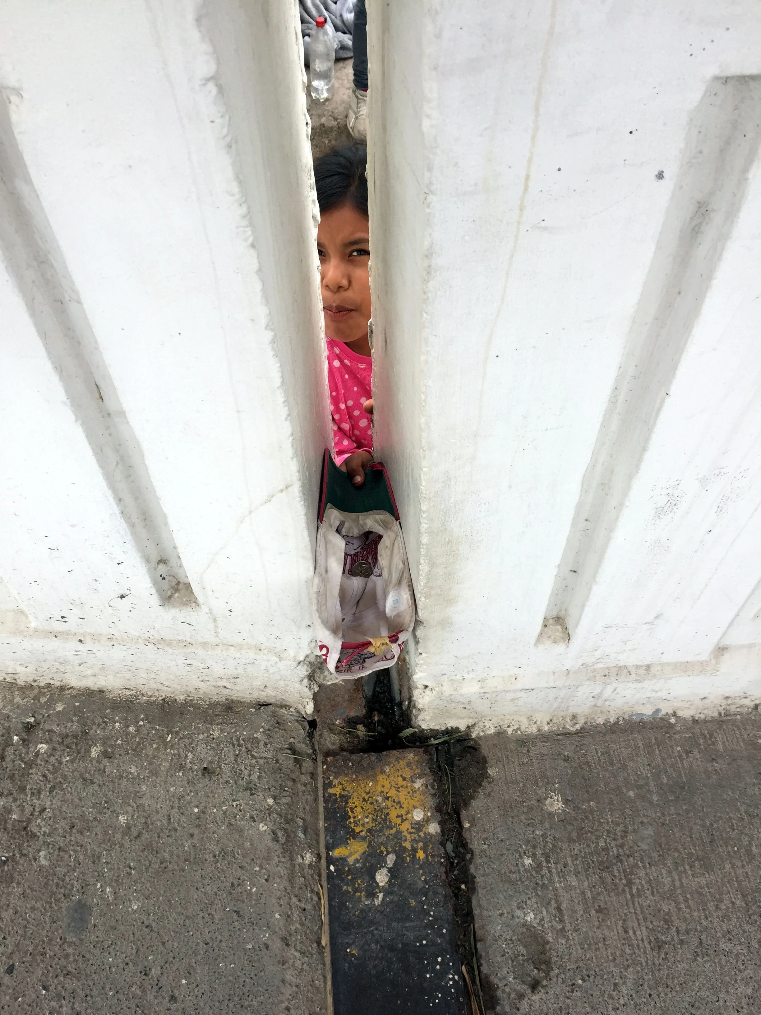 "Child on Bridge U.S.A / Mexico" Photograph 2016