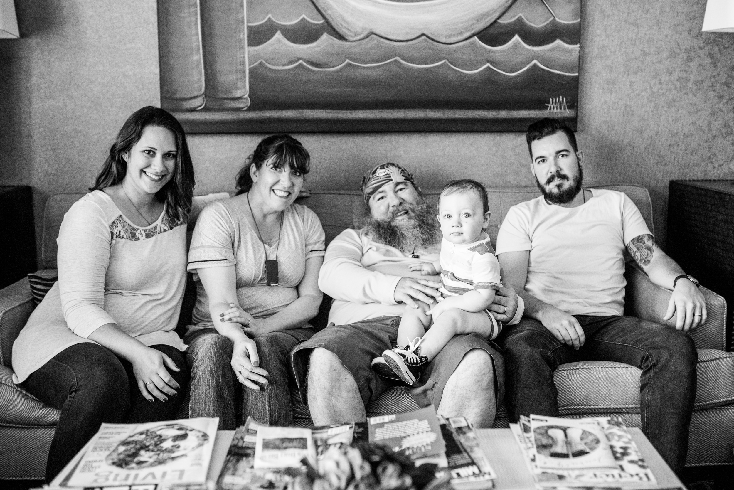 Terry sits with his family who he credits as being the most important part of his life besides God. From left to right: Daughter-in-law Melissa, wife Colleen, grandson Joshua, and son Josh. 