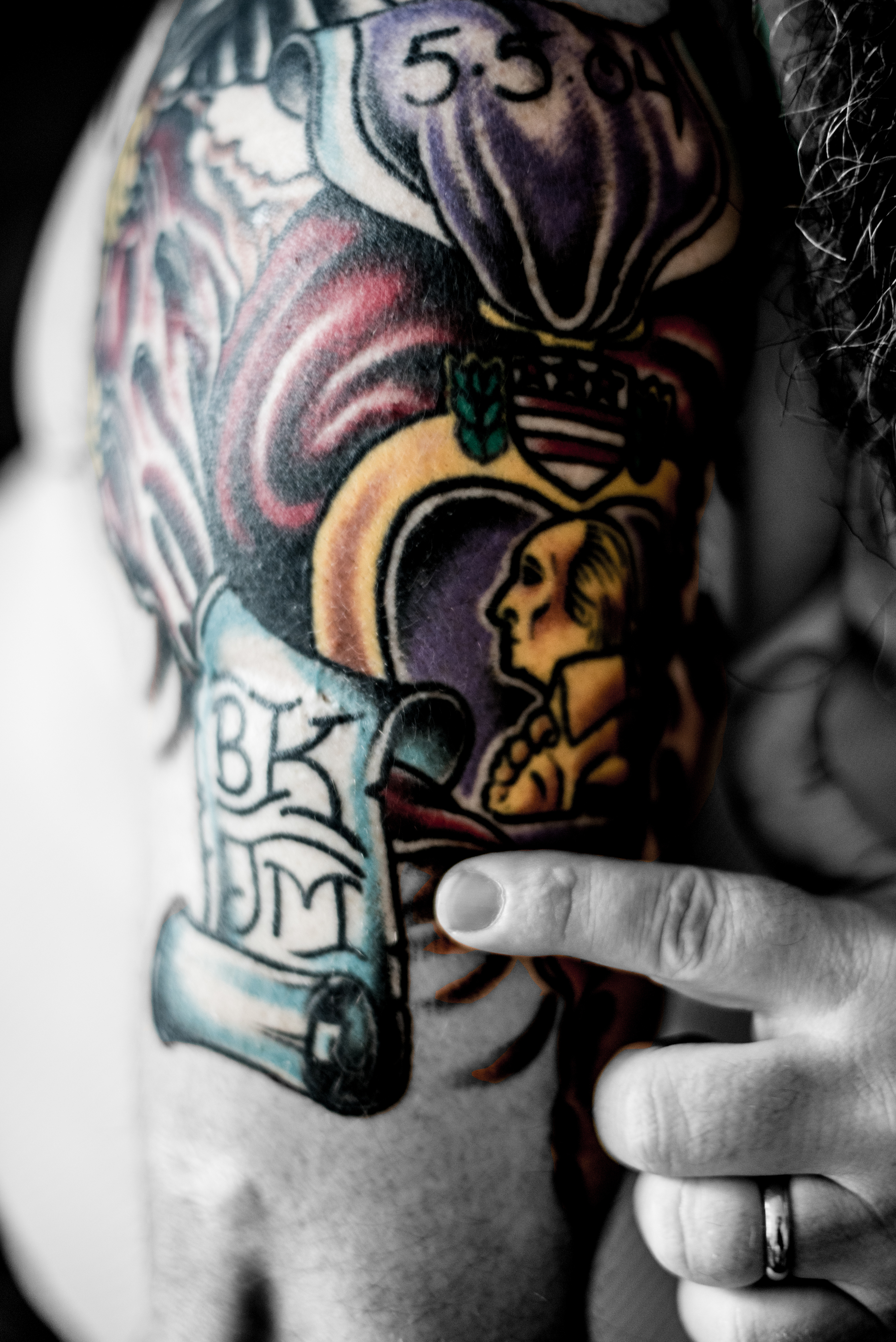 Terry's tattoos that cover some of his physical scarring. This was a piece put together to honor his service and those who were lost (work by Joshua Snyder of Iron Rite Tattoo). 