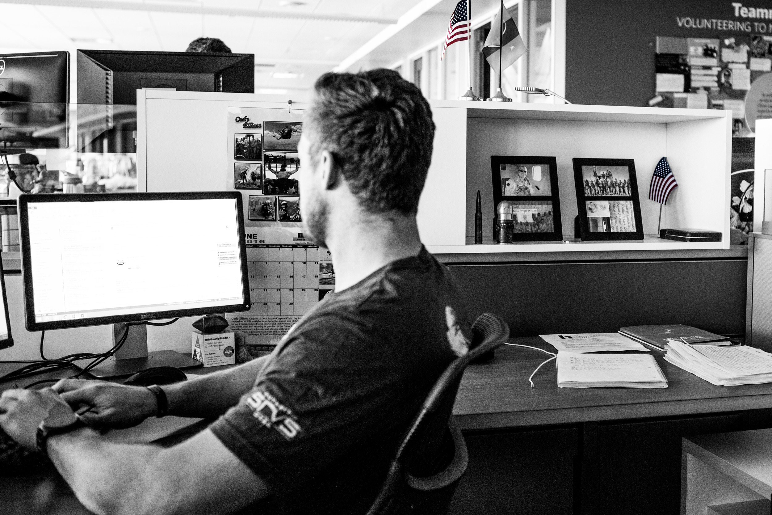 Our brothers never leave us. This is evident here in Evan's office space, where memories of Brandon Lara serve as reminders of true sacrifice.