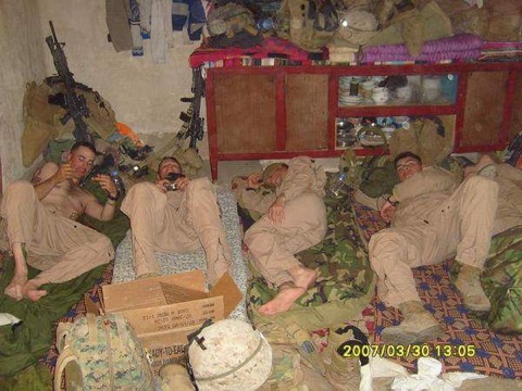 Fuller with fellow Marines at their COP in Fallujah. Fuller is on the far left. 