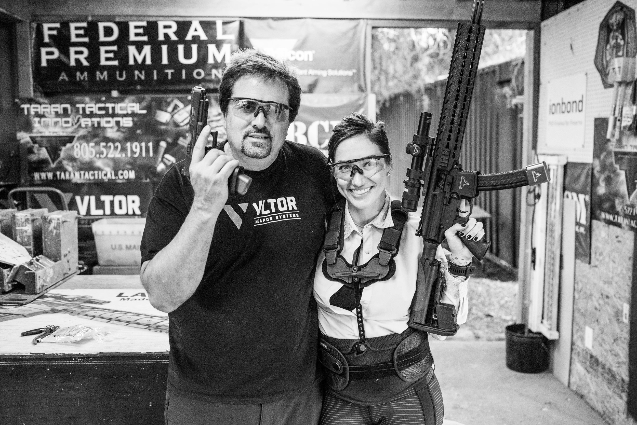 Jacqueline stands with her trainer, Taran Butler, of Taran Tactical.