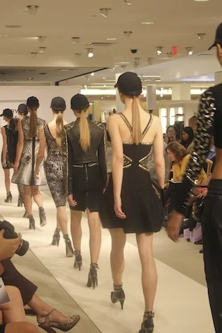 The final walk showcases details in the collection such as embellishments and animal prints.