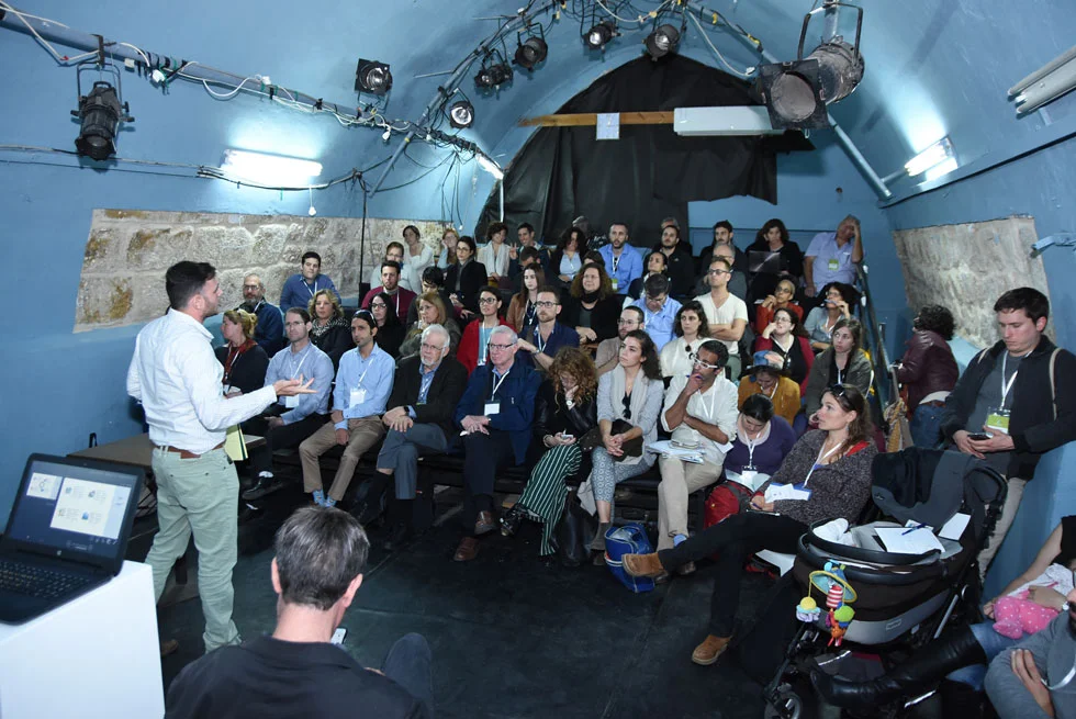 Tomer Chelouche presenting research findings at the 2017 conference of the Israel Urban Forum (photo: Oshri Cohen)