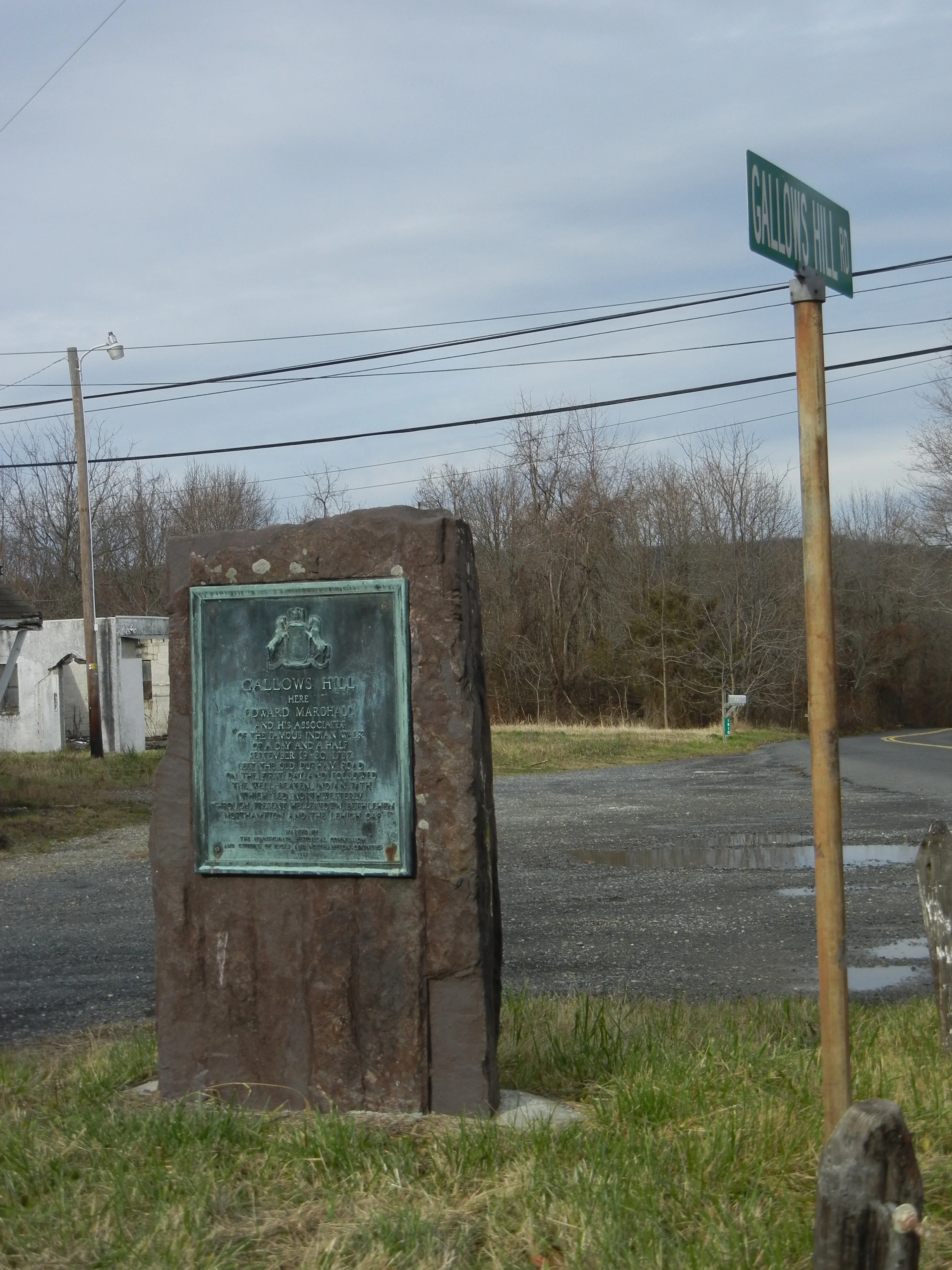 One of many plaques documenting the Walking Purchase along Route 412 and the commencement of Gallows Hill Road.
