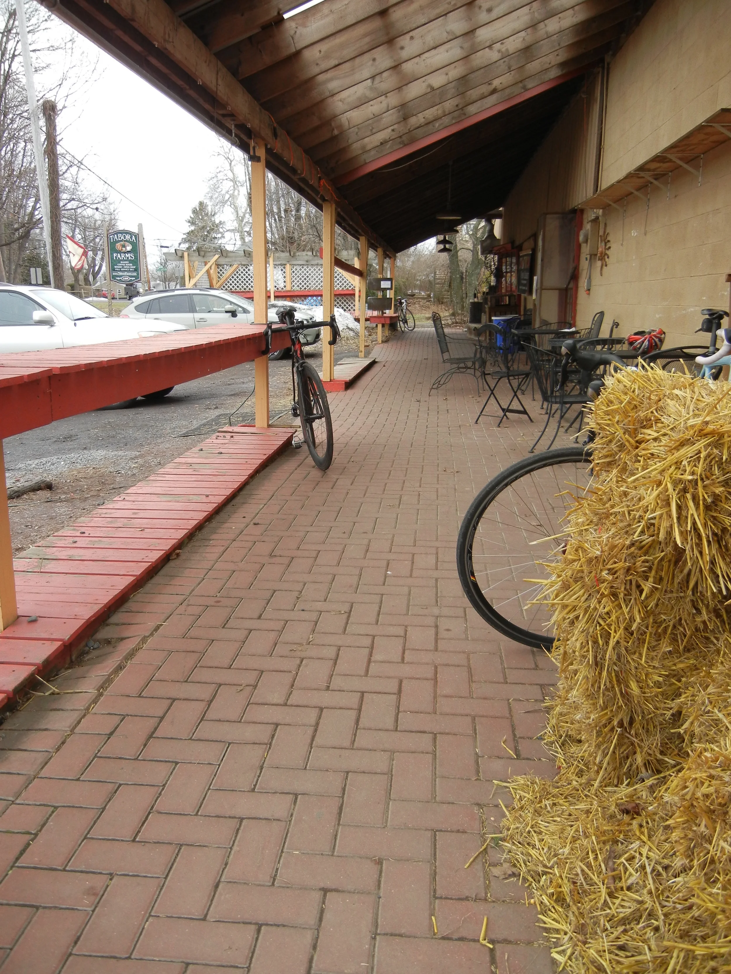 The porch of Tabora Farm & Orchard has a lot of room to lean dozens of bikes.